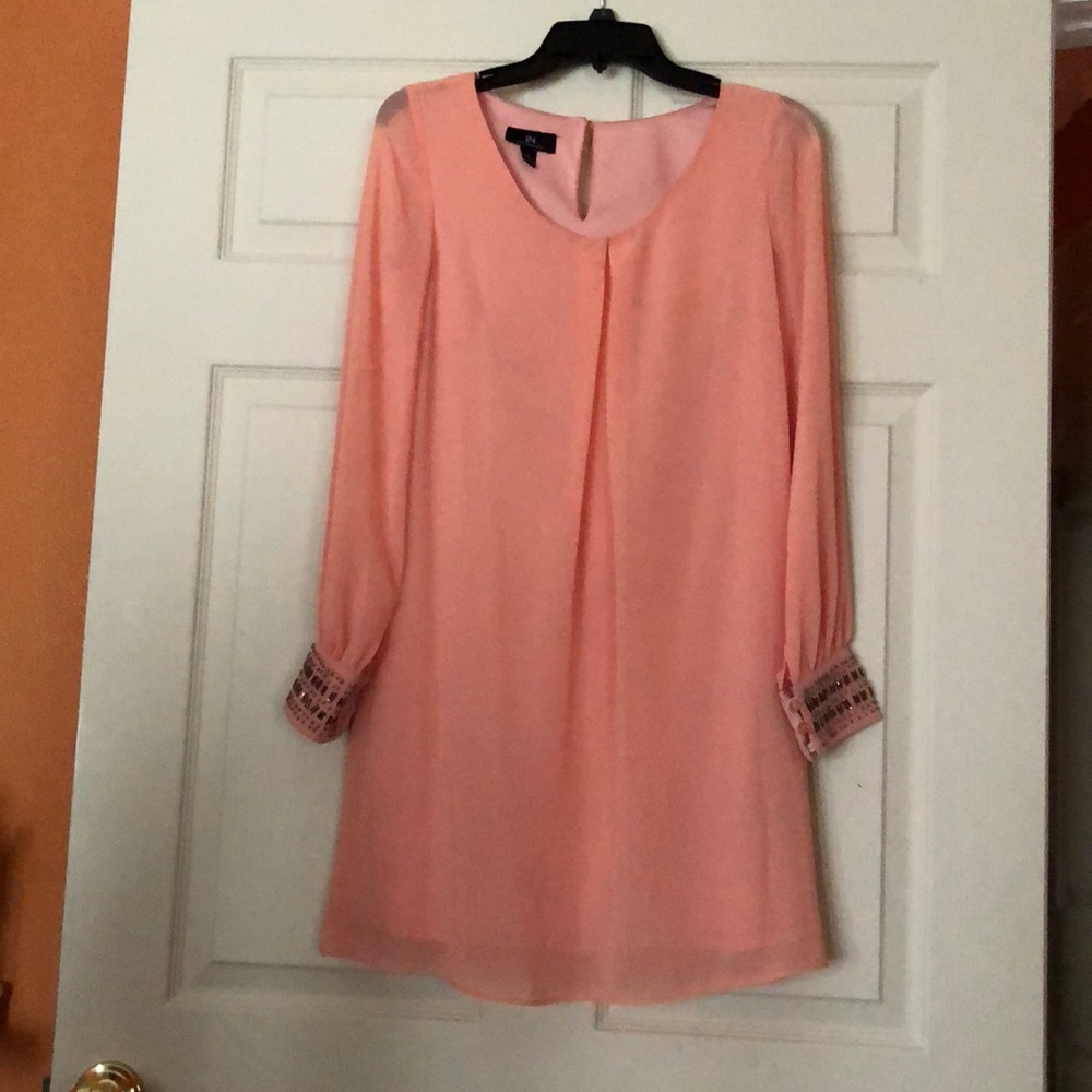 Peachy colored dress